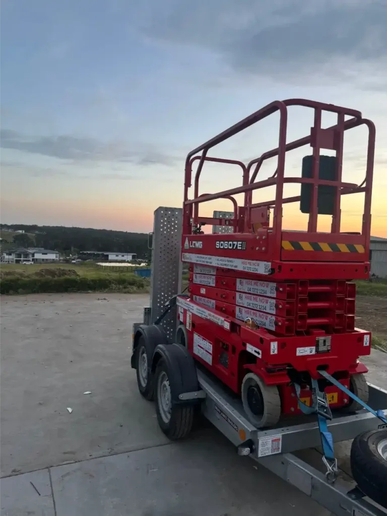 scissor lift trailer by the sunset